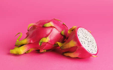 Tasty dragon fruit on color backgroundの写真素材