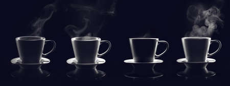 Cups of hot espresso on dark backgroundの写真素材