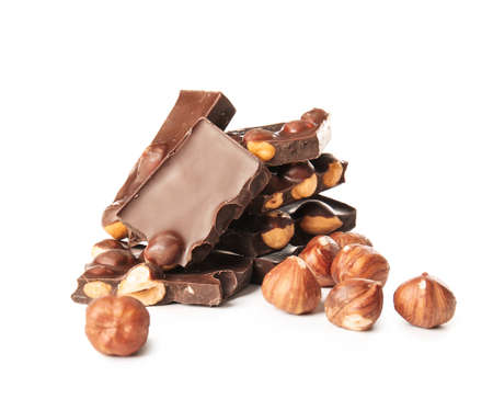 Sweet chocolate with nuts on white background