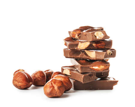 Sweet chocolate with nuts on white backgroundの写真素材