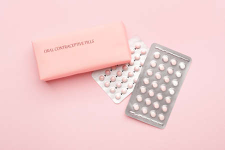 Contraceptive pills on color backgroundの写真素材