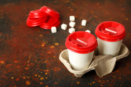 Takeaway coffee cups on tableの写真素材