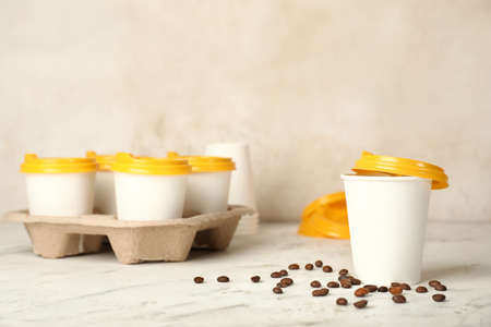 Takeaway coffee cups on tableの写真素材