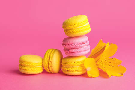 Tasty macarons on color backgroundの写真素材