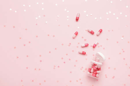 Jar of sleeping pills on color backgroundの写真素材