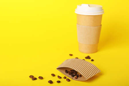 Takeaway coffee cup on color backgroundの写真素材