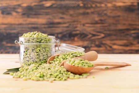 Green coffee beans on tableの写真素材