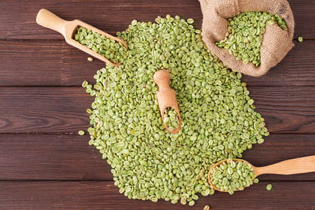 Green coffee beans on tableの写真素材