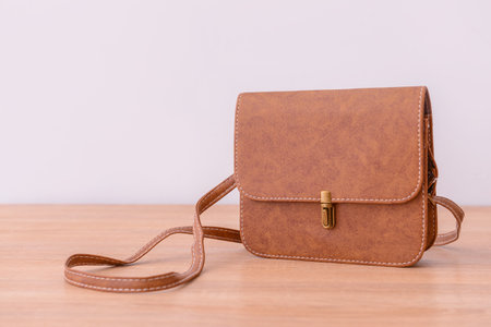 Stylish bag on wooden tableの写真素材