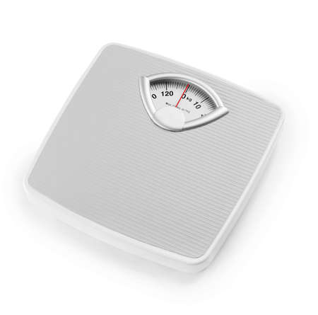 Weight scales on white background. Slimming conceptの写真素材