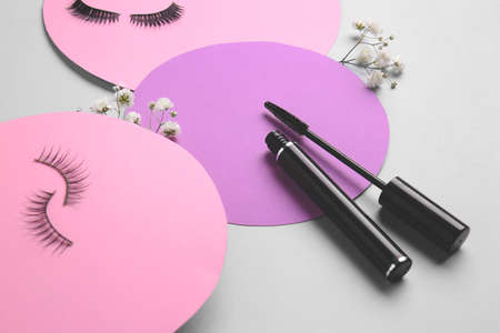 Mascara with fake eyelashes on light backgroundの写真素材