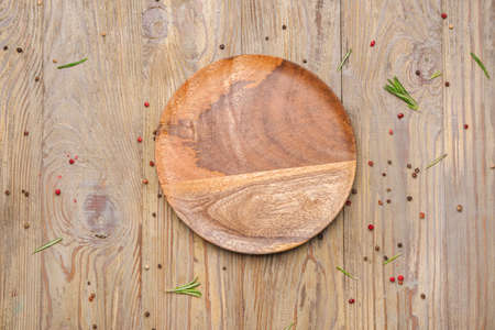 Clean plate on wooden backgroundの写真素材
