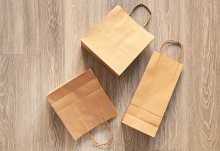 Paper shopping bags on floor, top viewの写真素材