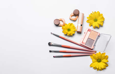 Makeup cosmetics with accessories on white backgroundの写真素材
