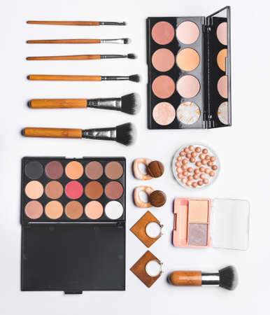 Makeup cosmetics with accessories on white backgroundの写真素材