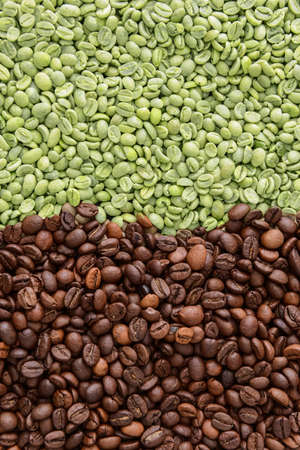 Green and roasted coffee beans as backgroundの写真素材