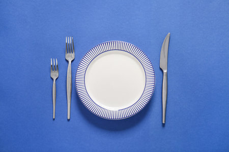 Simple table setting on color backgroundの写真素材