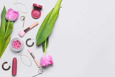 Makeup cosmetics with accessories on white backgroundの写真素材