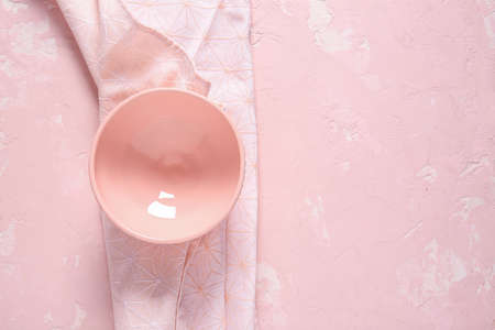 Clean bowl on color backgroundの写真素材