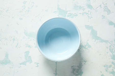 Clean bowl on color backgroundの写真素材