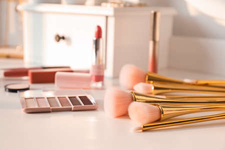 Set of brushes and decorative cosmetics on table of makeup artistの写真素材