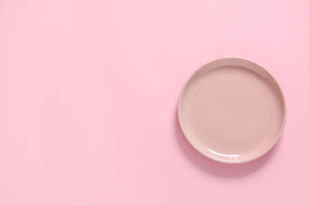 Clean plate on color backgroundの写真素材