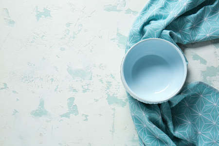 Clean bowl on color backgroundの写真素材