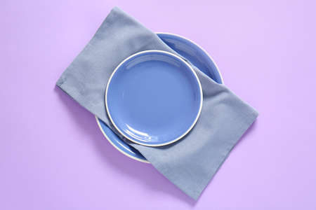 Clean plates on color backgroundの写真素材