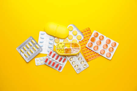 Composition with different pills on color backgroundの写真素材