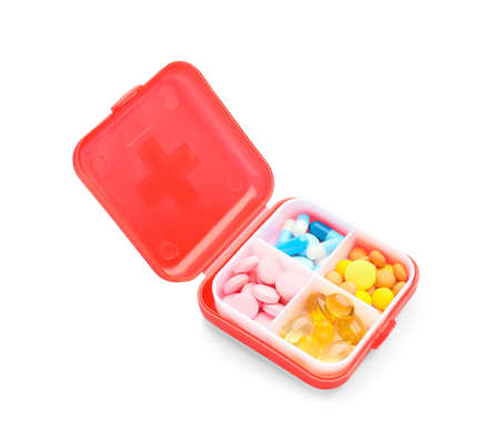 Container with pills on white background