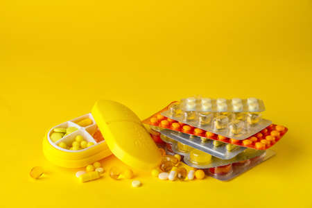 Many different pills on color backgroundの写真素材