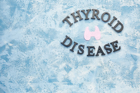 Text THYROID DISEASE on color backgroundの写真素材