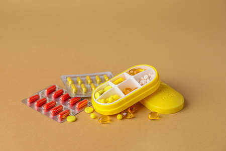 Many different pills on color backgroundの写真素材