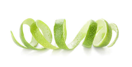 Peel of green lime on white background