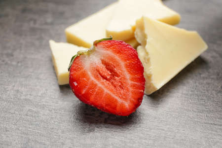 Tasty strawberry with chocolate on dark backgroundの写真素材
