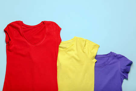 Stylish t-shirts on color backgroundの写真素材