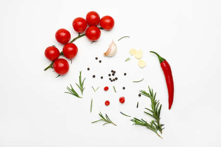 Fresh rosemary and spices on white backgroundの写真素材