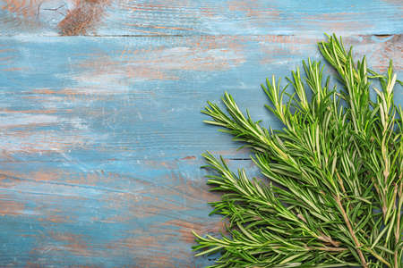 Fresh rosemary on wooden backgroundの写真素材