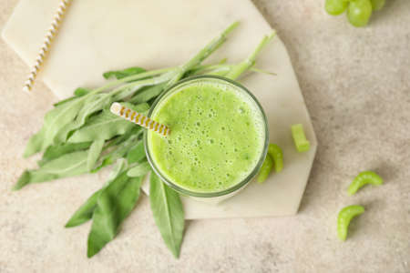 Glass of healthy smoothie on tableの写真素材