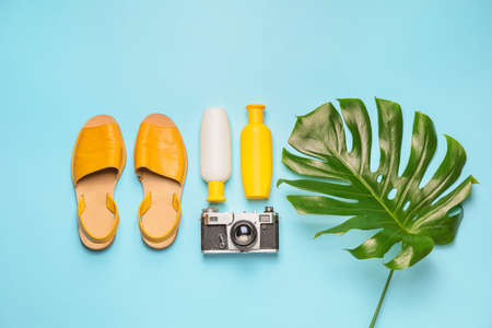 Summer composition with beach accessories on color backgroundの写真素材