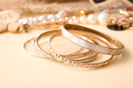 Beautiful bracelets on color backgroundの写真素材
