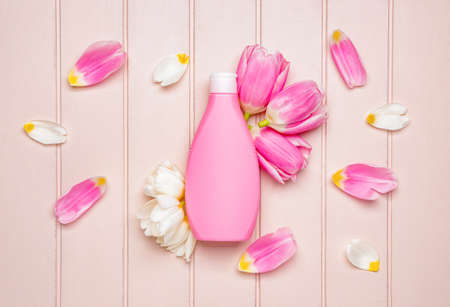 Shower gel on white wooden backgroundの写真素材