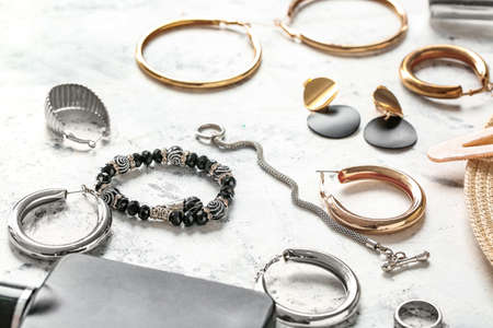 Composition with beautiful jewelry on light backgroundの写真素材