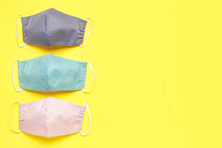 Medical masks on color backgroundの写真素材