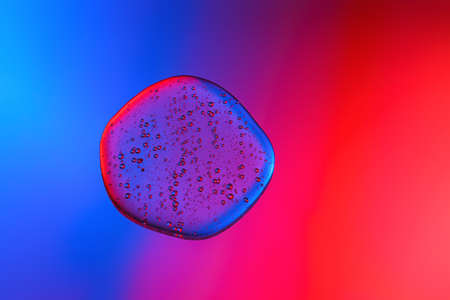 Shower gel on color backgroundの写真素材