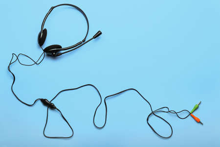 Modern headset on color backgroundの写真素材