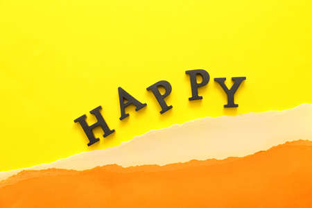 Word HAPPY on color backgroundの写真素材