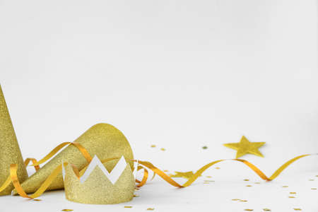 Party hats and decor on white backgroundの写真素材