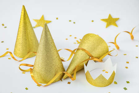 Party hats and decor on white backgroundの写真素材
