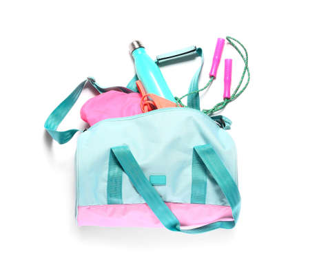 Bag with sportswear and accessories on white backgroundの写真素材